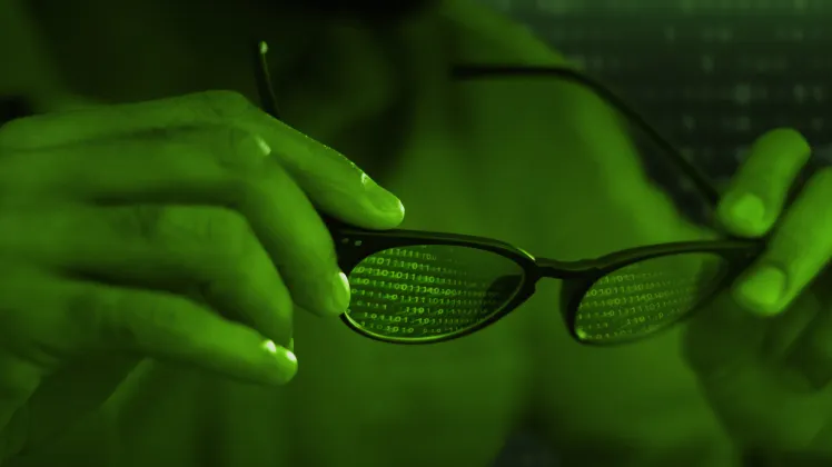 A stylized graphic of the Kali Linux logo with a Docker whale